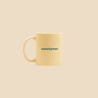 Side of Professional Salad Eaters Mug with "Sweetgreen" logo across the side.