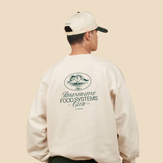 Person with back to camera wearing Regenerative Food Systems Club Two Tone Hat and Crewneck Sweatshirt.